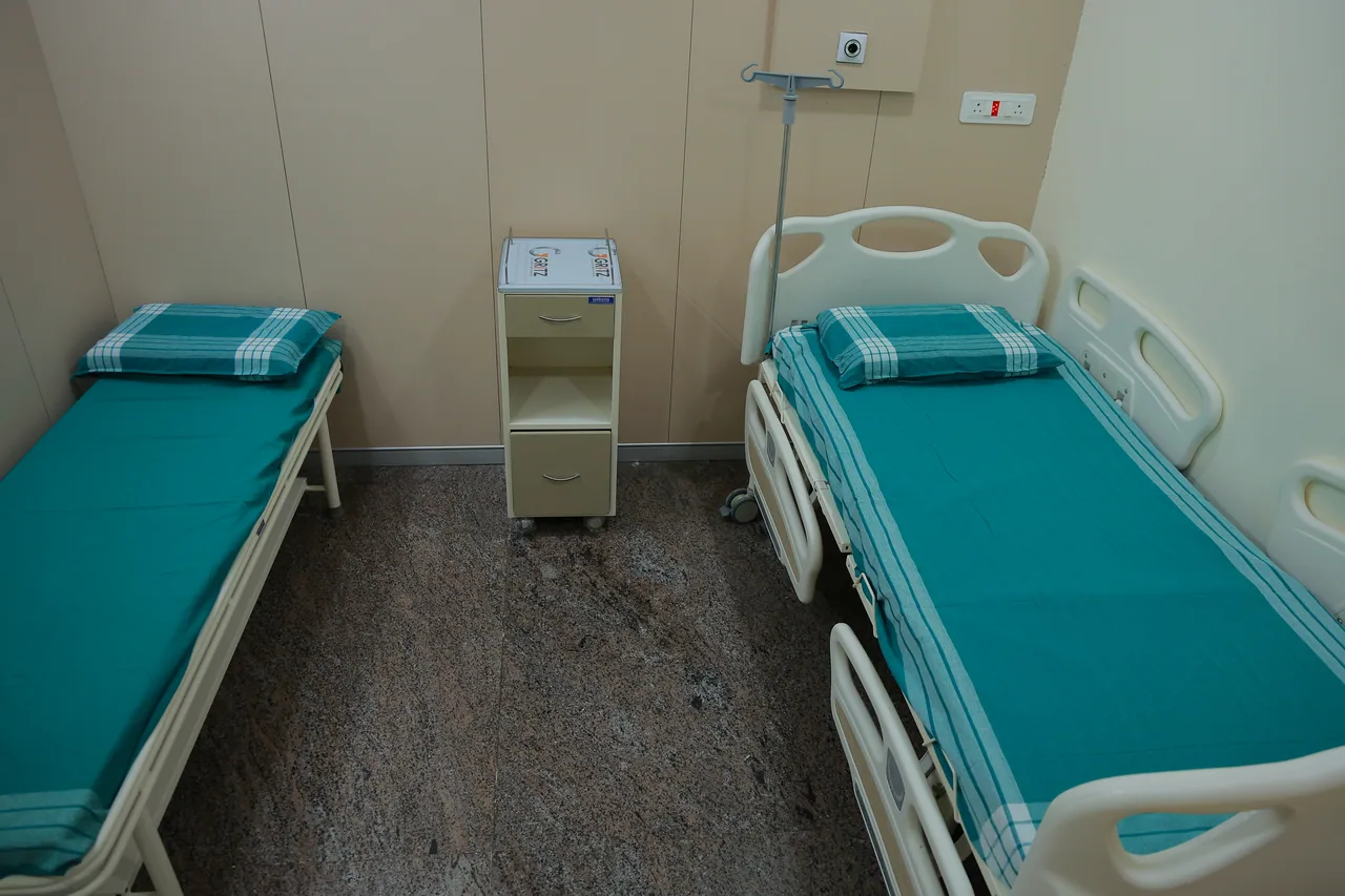 Clean twin-sharing semi-private ward room at Tara Hospital
